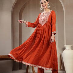 Kimayra Cotton Calf Length Solid 3/4 Sleeve Round Neck Flared Kurta Suit Set