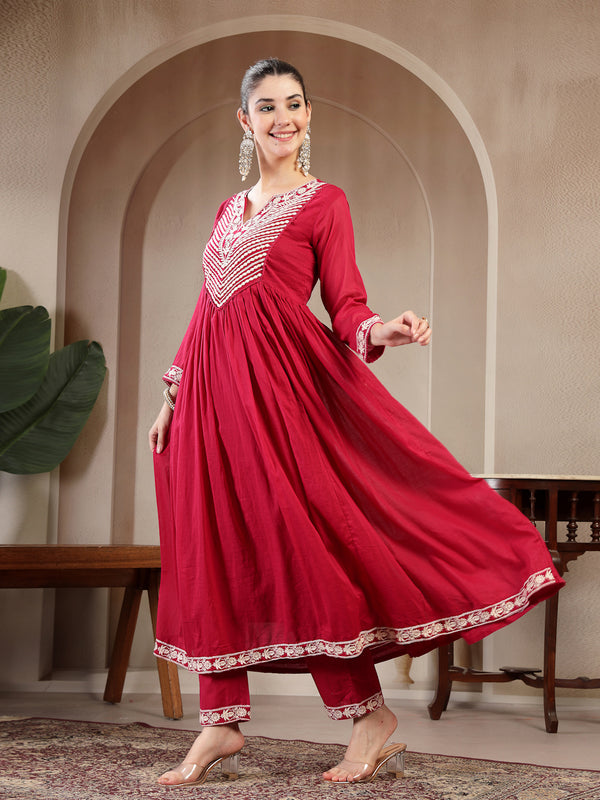 Kimayra Cotton Calf Length Solid 3/4 Sleeve Round Neck Flared Kurta Suit Set