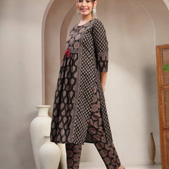 Kimayra Cotton Calf Length Printed 3/4 Sleeve Key Hole Neck Flared Kurta Suit Set