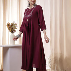 Kimayra Rayon Calf Length Solid 3/4 Sleeves Round Neck Flared Kurta Suit Set